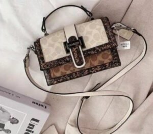 COACH STUDDED WITH OG BOX AND DUST BAG PREMIUM QUALITY (WHITE)