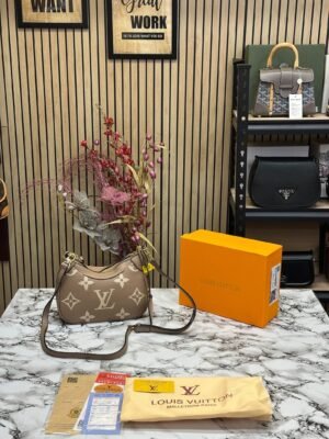 LOUIS VUITTON BICOLOR MONOGRAM EMPREINTE