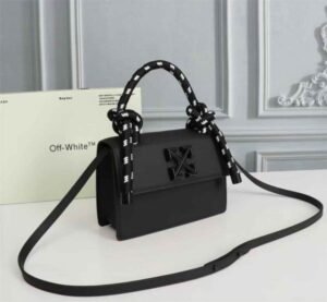 Off-White Leather Insert Black Gummy with Metallic Black Arrows At Front. Rope Handle Jitney 1.4 Shoulder Bag (D88532 Black)